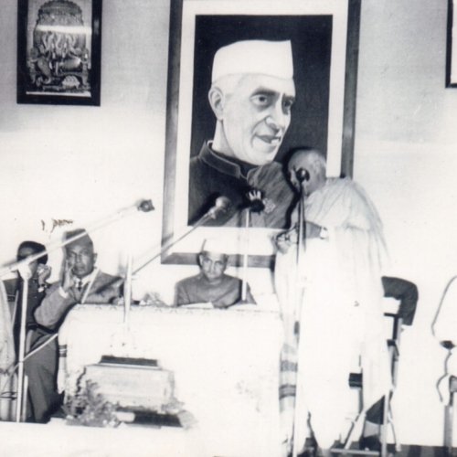 K.G. Wodeyar, the President of MDF, is seen delivering a speech.